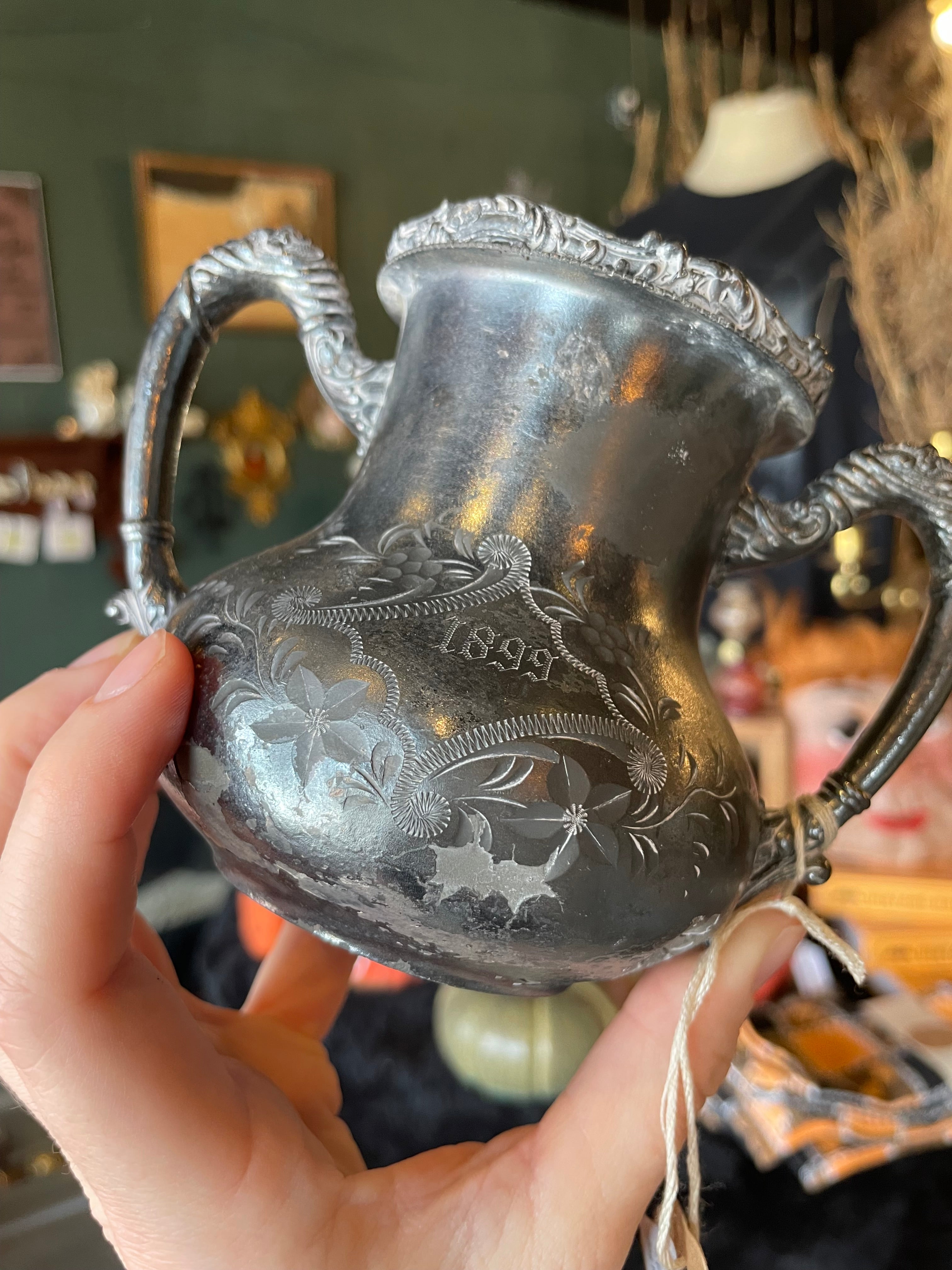 1899 Hammered Creamer Pitcher